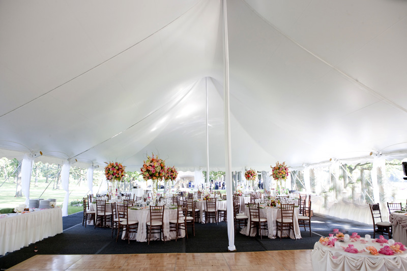 tent with high floral centerpieces