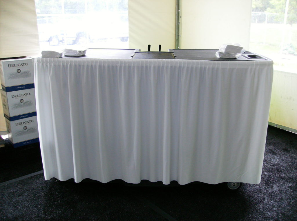 portable bar with white skirting