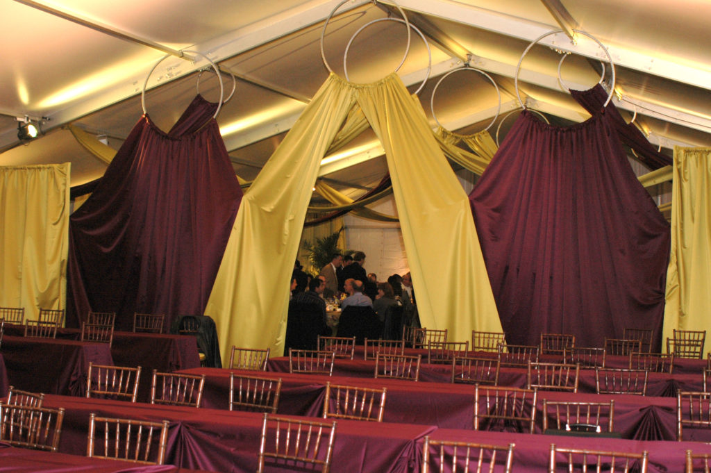 corporate event tent with decor for event theme