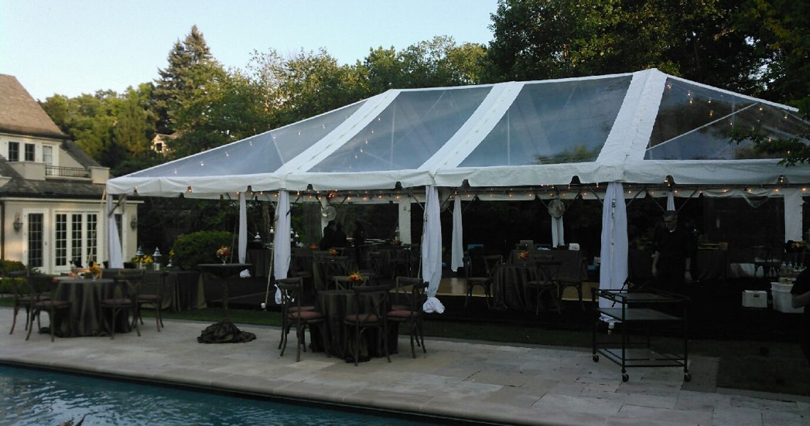 clear tent by pool ready for birthday party